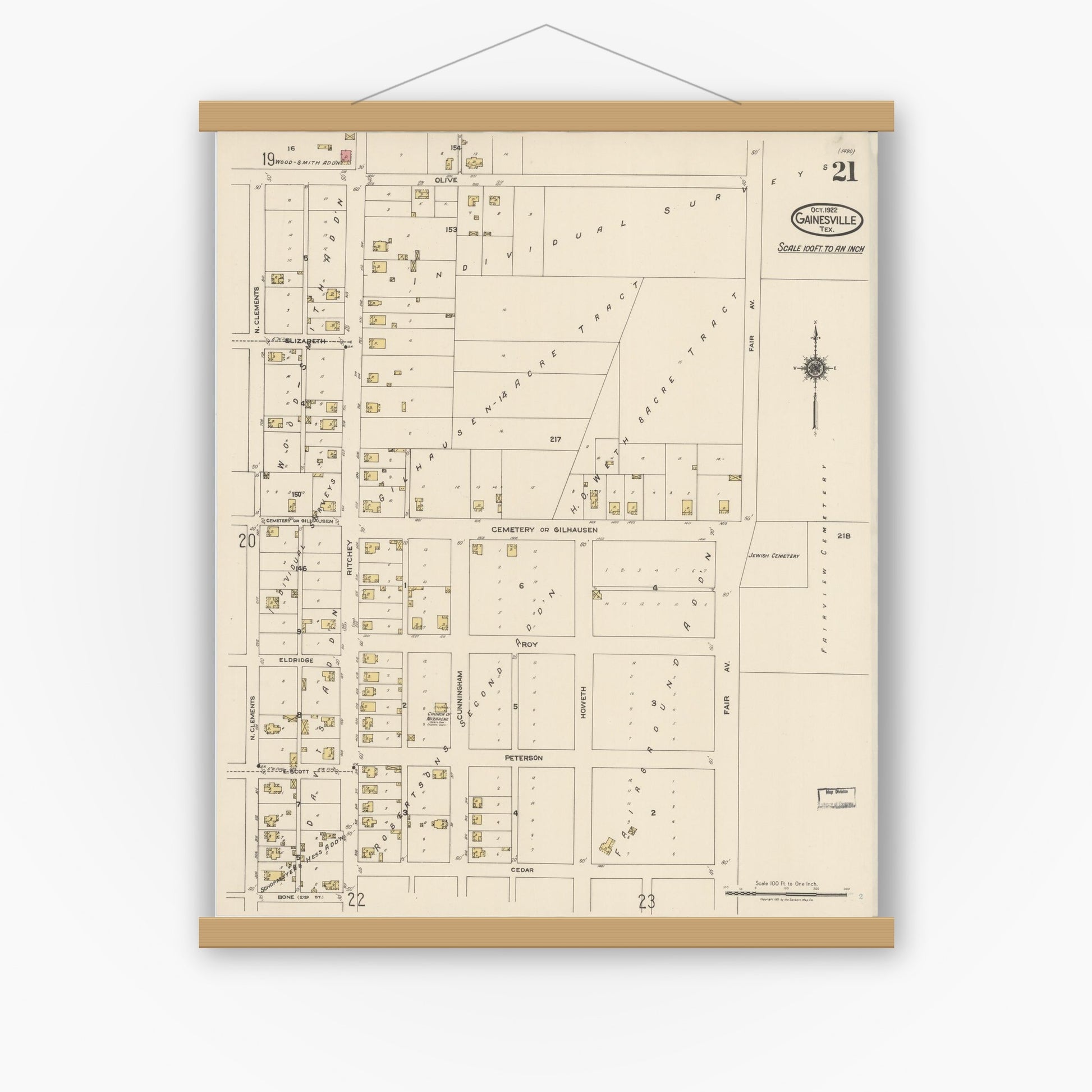 Old map wall art mockup — magnetic wood frame on white wall — Sanborn Fire Insurance Map from Gainesville, Cooke County, Texas (1922), Sheet #0021