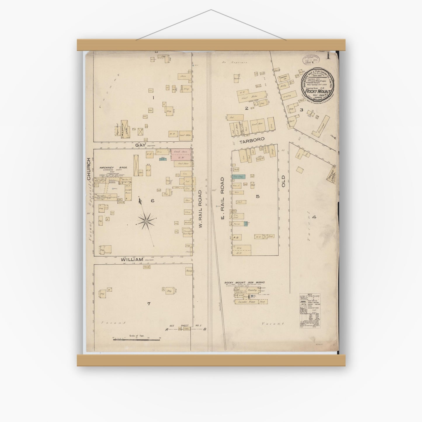 Old map wall art mockup — magnetic wood frame on white wall — Sanborn Fire Insurance Map from Rocky Mount, Edgecombe And Nash Counties, North Carolina (1885) - Complete Map Set