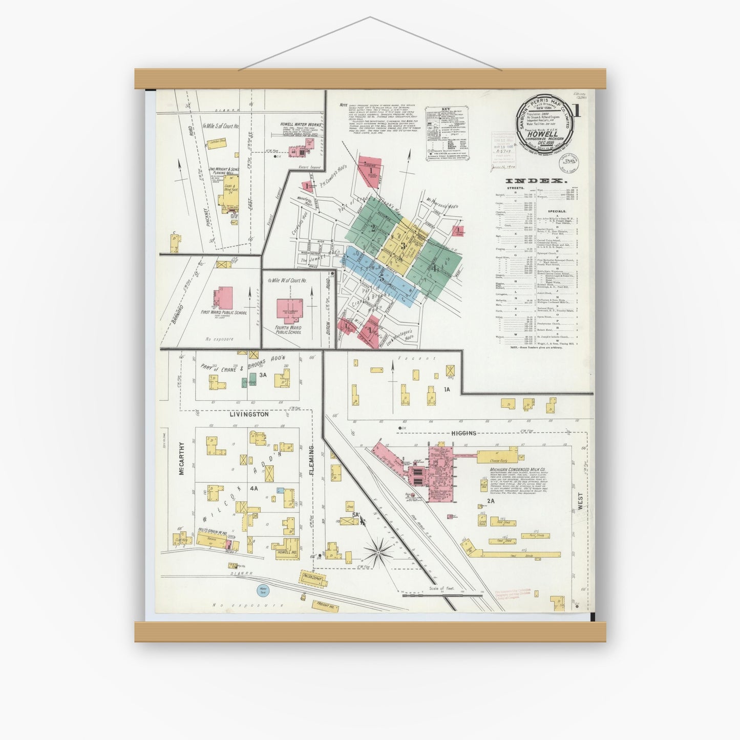 Old map wall art mockup — magnetic wood frame on white wall — Sanborn Fire Insurance Map from Howell, Livingston County, Michigan (1899) - Complete Map Set