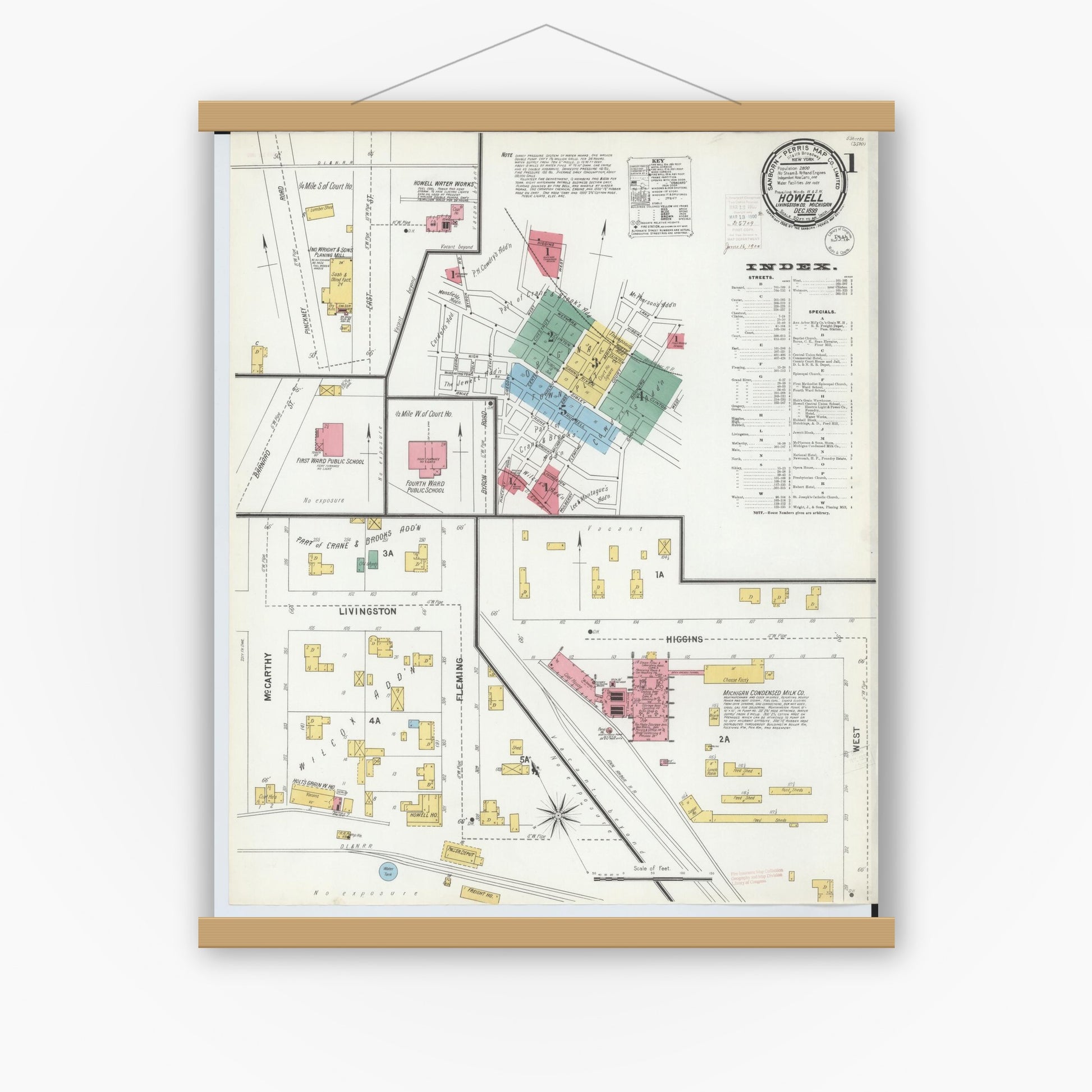 Old map wall art mockup — magnetic wood frame on white wall — Sanborn Fire Insurance Map from Howell, Livingston County, Michigan (1899) - Complete Map Set