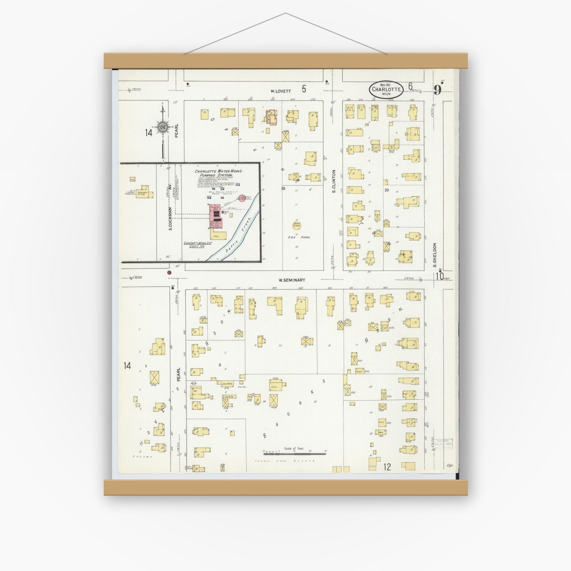 Old map wall art mockup — magnetic wood frame on white wall — Sanborn Fire Insurance Map from Charlotte, Eaton County, Michigan (1911), Sheet #0009