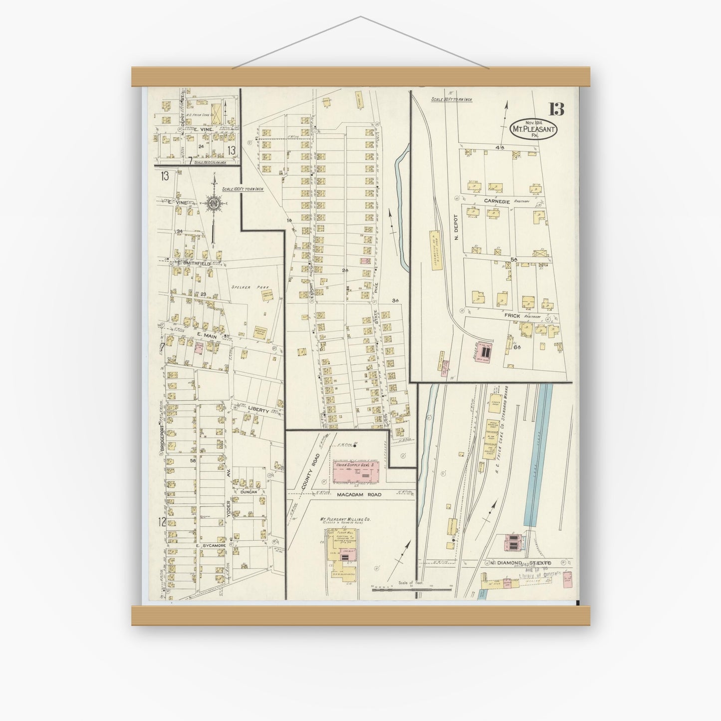 Old map wall art mockup — magnetic wood frame on white wall — Sanborn Fire Insurance Map from Mount Pleasant, Westmoreland County, Pennsylvania (1914), Sheet #0013