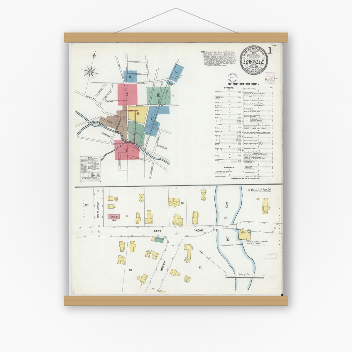 Old map wall art mockup — magnetic wood frame on white wall — Sanborn Fire Insurance Map from Lowville, Lewis County, New York (1902) - Complete Map Set
