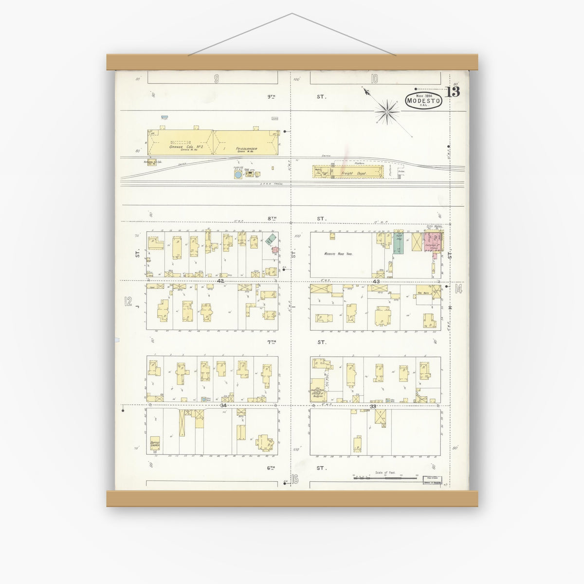 Old map wall art mockup — magnetic wood frame on white wall — Sanborn Fire Insurance Map from Modesto, Stanislaus County, California (1894), Sheet #0013