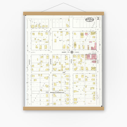 Old map wall art mockup — magnetic wood frame on white wall — Sanborn Fire Insurance Map from What Cheer, Keokuk County, Iowa (1916), Sheet #0002