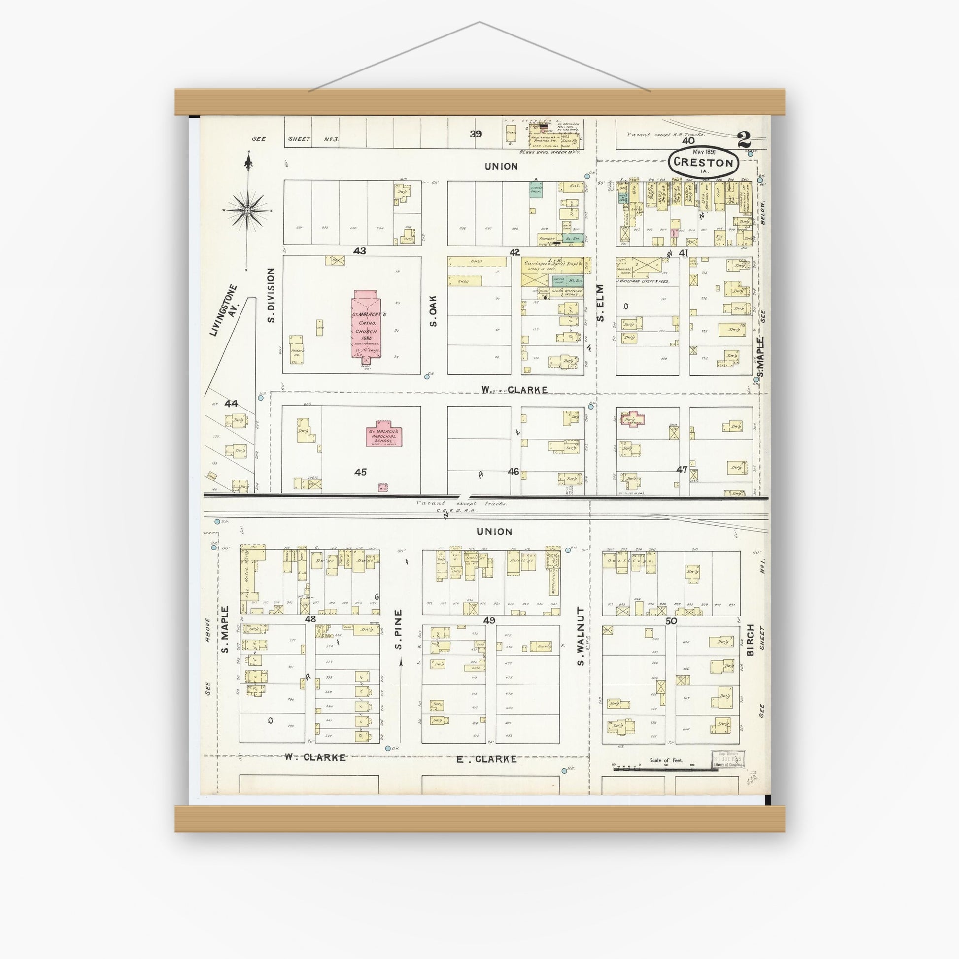Old map wall art mockup — magnetic wood frame on white wall — Sanborn Fire Insurance Map from Creston, Union County, Iowa (1891), Sheet #0002