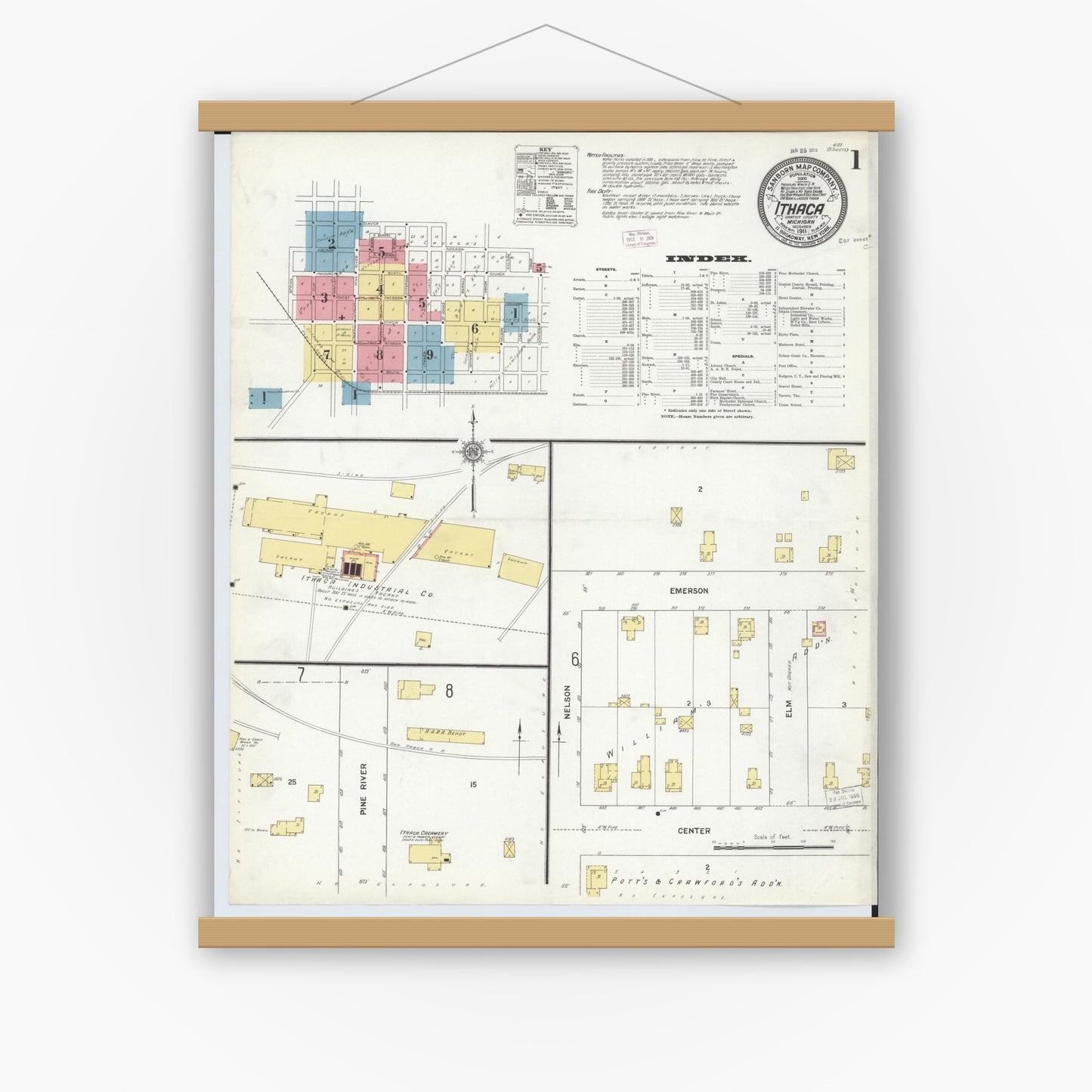 Old map wall art mockup — magnetic wood frame on white wall — Sanborn Fire Insurance Map from Ithaca, Gratiot County, Michigan (1911), Sheet #0001