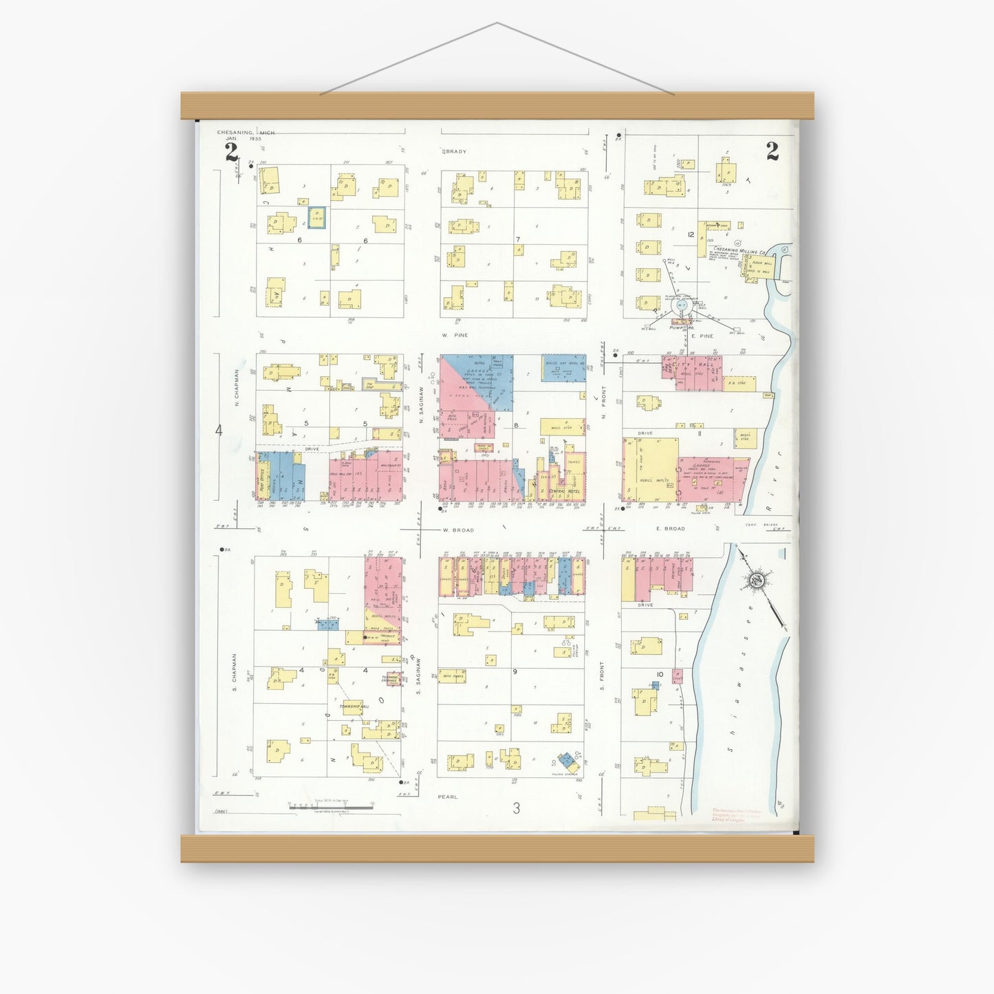 Old map wall art mockup — magnetic wood frame on white wall — Sanborn Fire Insurance Map from Chesaning, Saginaw County, Michigan (1935), Sheet #0002