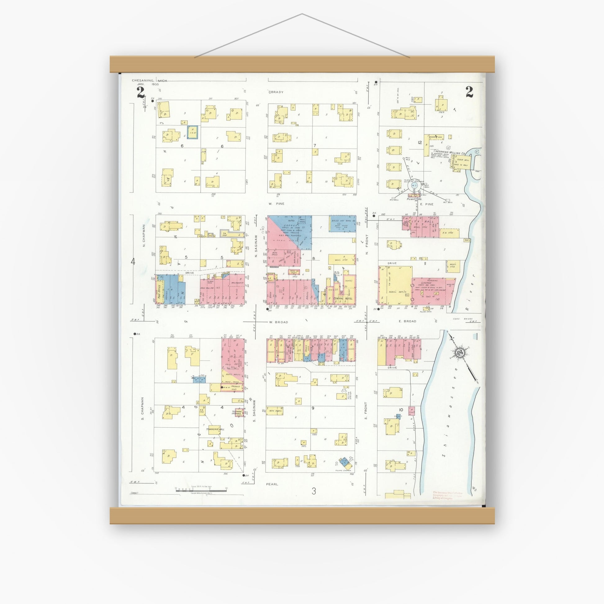 Old map wall art mockup — magnetic wood frame on white wall — Sanborn Fire Insurance Map from Chesaning, Saginaw County, Michigan (1935), Sheet #0002