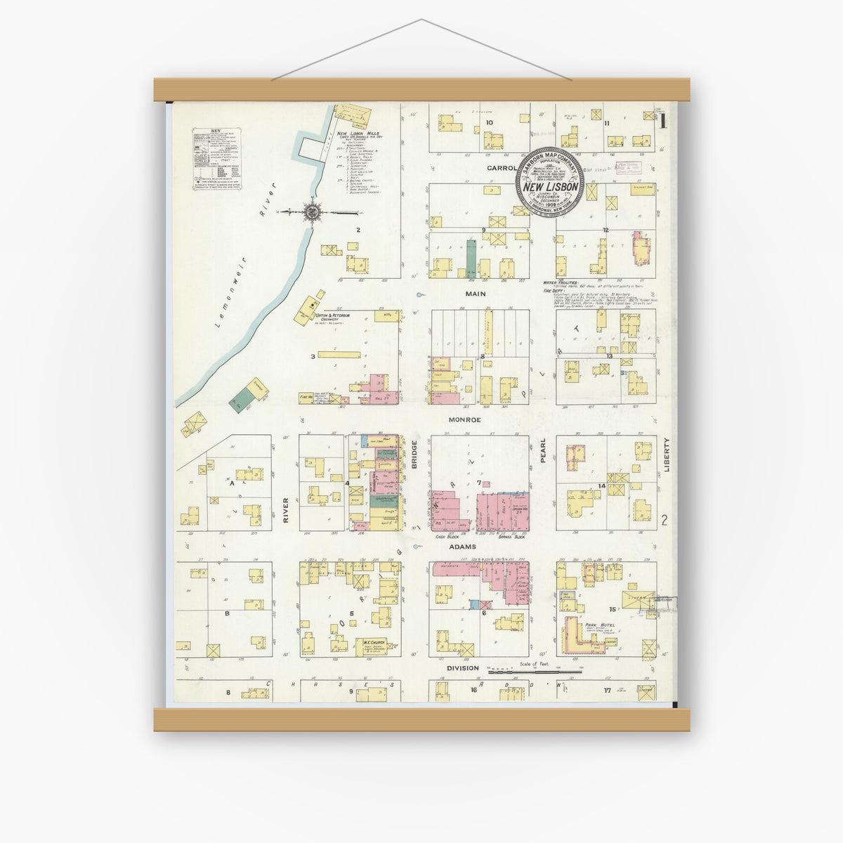 Old map wall art mockup — magnetic wood frame on white wall — Sanborn Fire Insurance Map from New Lisbon, Juneau County, Wisconsin (1909), Sheet #0001