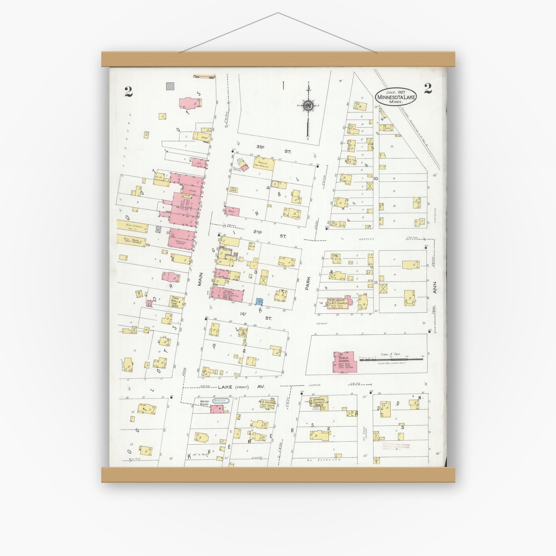 Old map wall art mockup — magnetic wood frame on white wall — Sanborn Fire Insurance Map from Minnesota Lake, Faribault County, Minnesota (1927), Sheet #0002