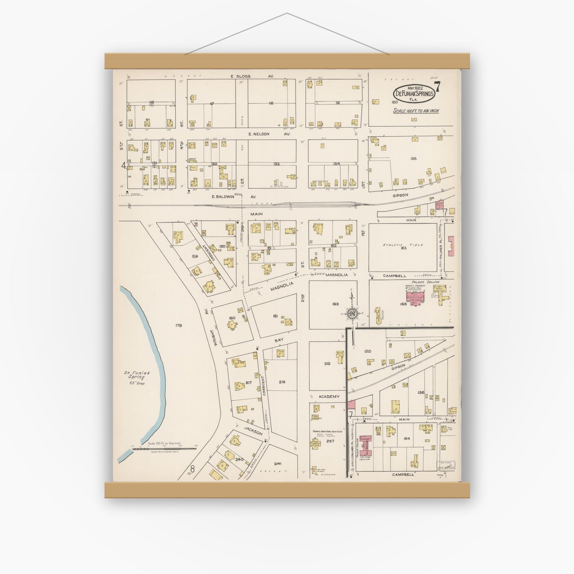 Old map wall art mockup — magnetic wood frame on white wall — Sanborn Fire Insurance Map from De Funiak Springs, Walton County, Florida (1922), Sheet #0007