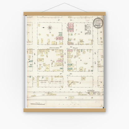 Old map wall art mockup — magnetic wood frame on white wall — Sanborn Fire Insurance Map from Sibley, Osceola County, Iowa (1886), Sheet #0001