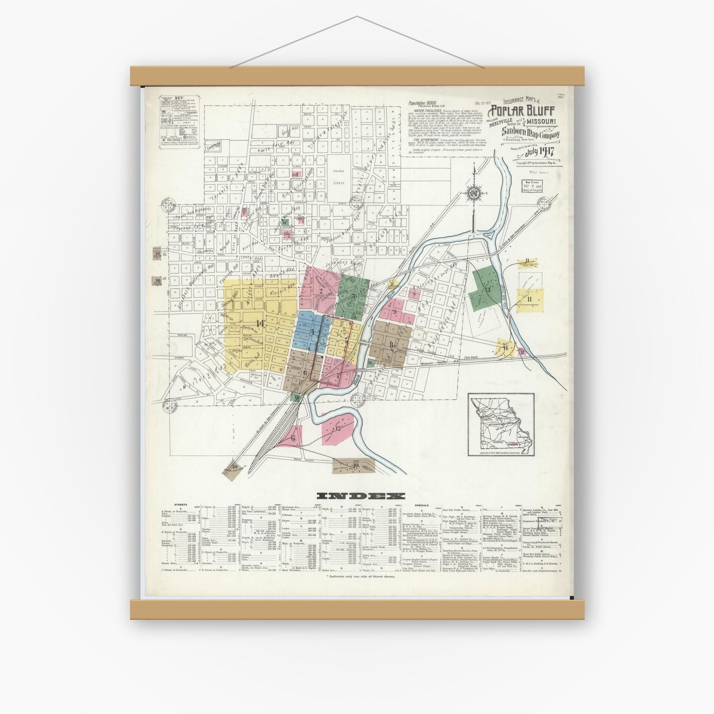 Old map wall art mockup — magnetic wood frame on white wall — Sanborn Fire Insurance Map from Poplar Bluff, Butler County, Missouri (1917) - Complete Map Set