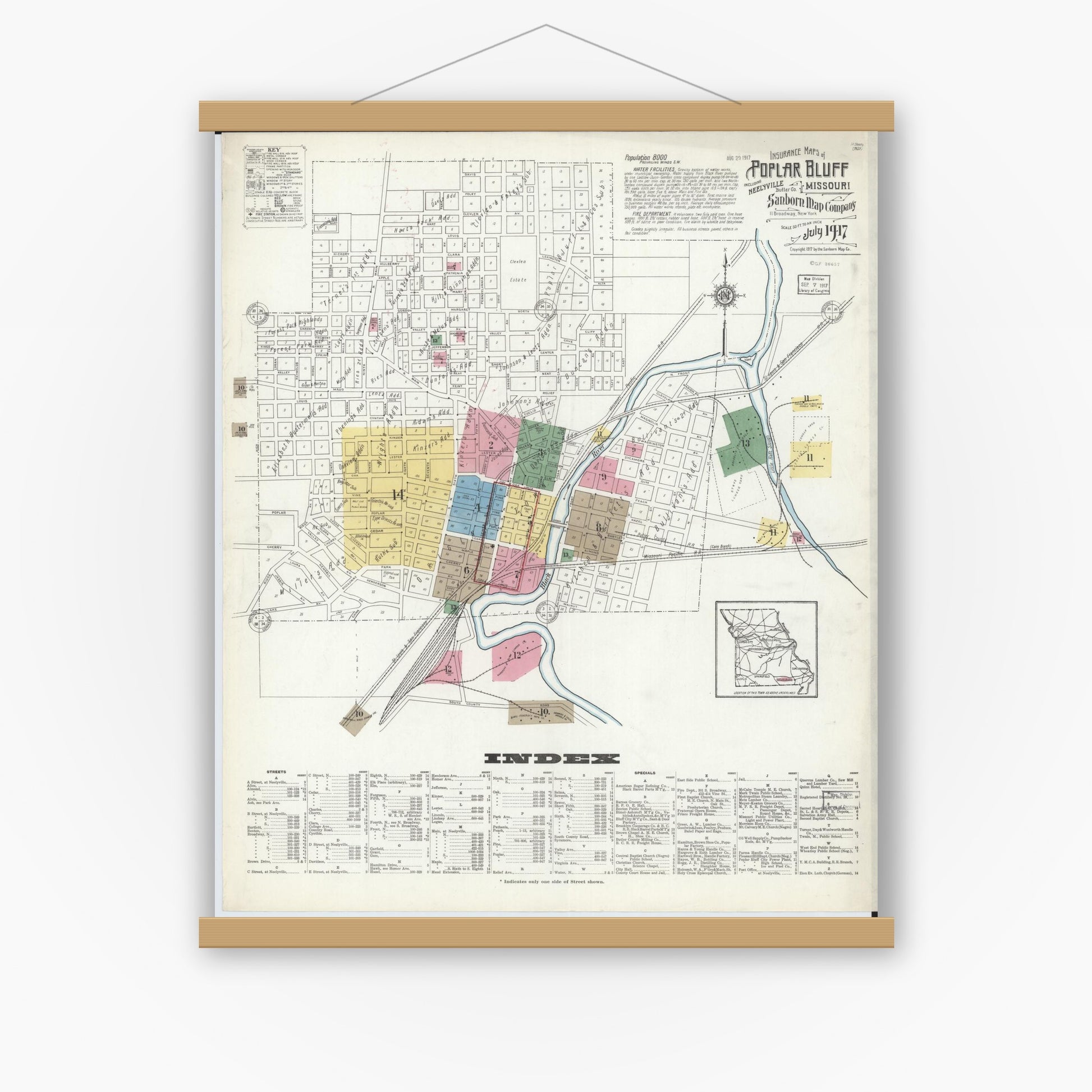 Old map wall art mockup — magnetic wood frame on white wall — Sanborn Fire Insurance Map from Poplar Bluff, Butler County, Missouri (1917) - Complete Map Set