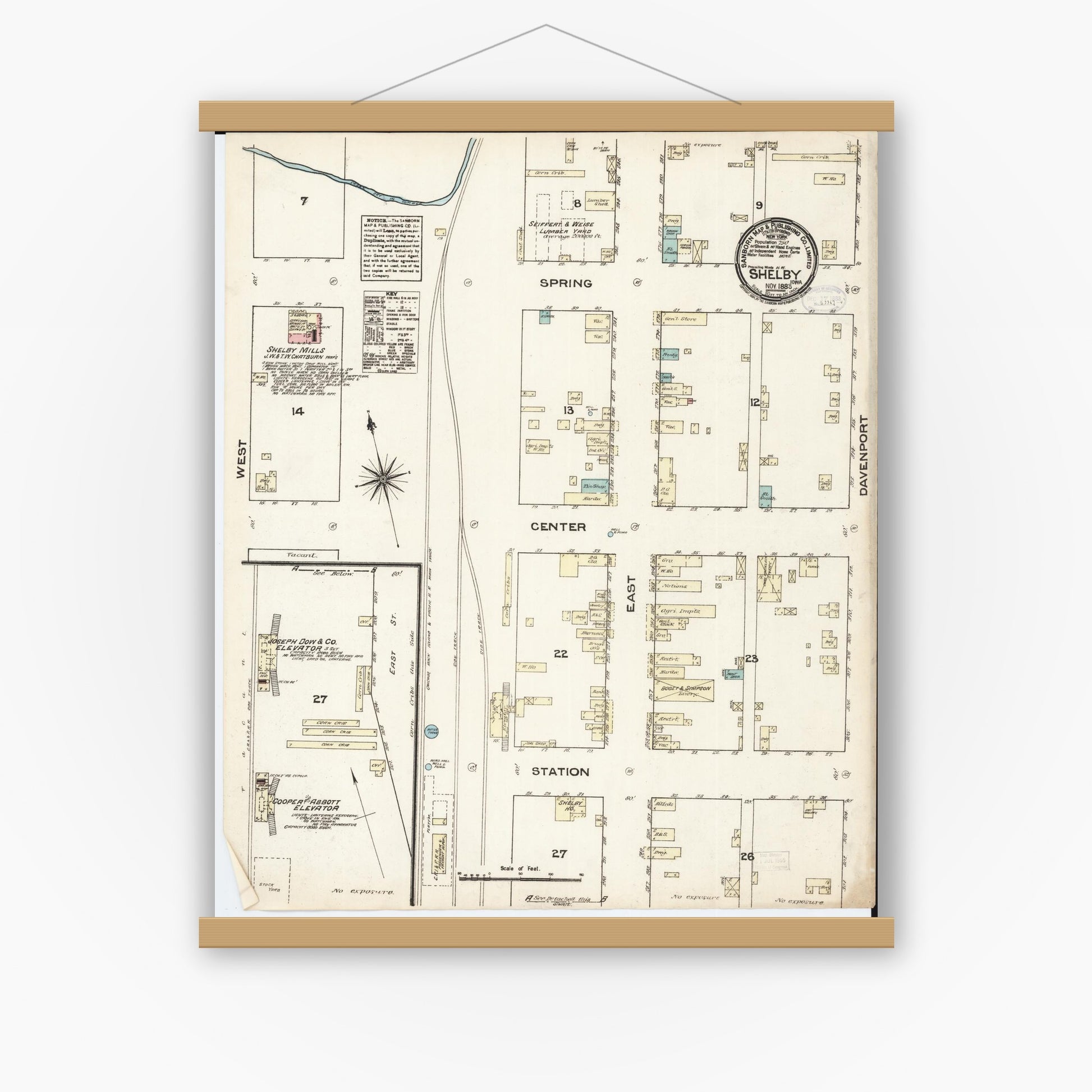 Old map wall art mockup — magnetic wood frame on white wall — Sanborn Fire Insurance Map from Shelby, Shelby County, Iowa (1883), Sheet #0001