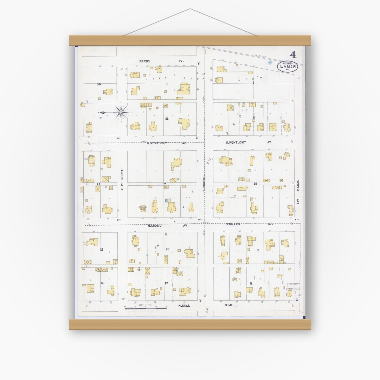 Old map wall art mockup — magnetic wood frame on white wall — Sanborn Fire Insurance Map from Lamar, Barton County, Missouri (1902), Sheet #0004