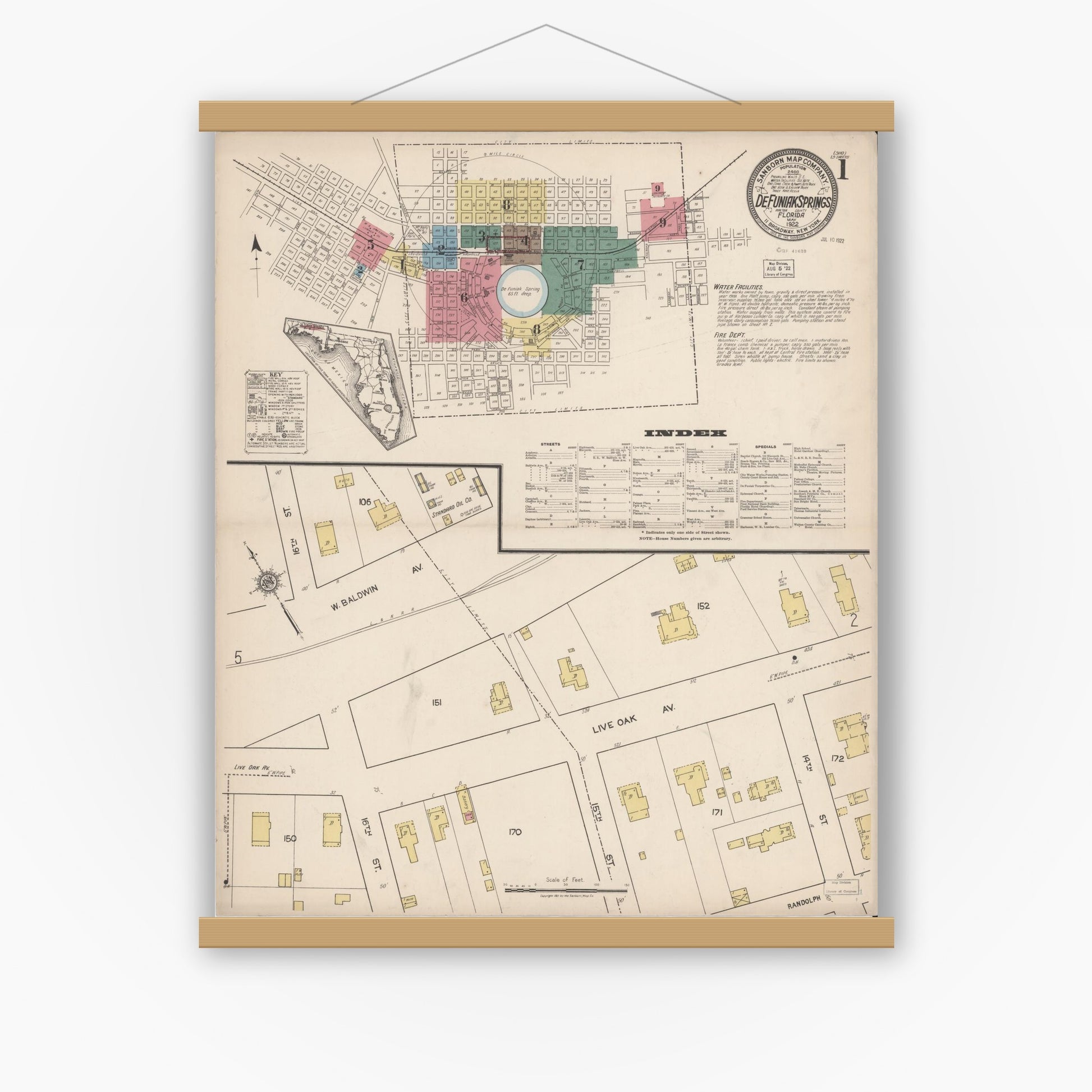 Old map wall art mockup — magnetic wood frame on white wall — Sanborn Fire Insurance Map from De Funiak Springs, Walton County, Florida (1922), Sheet #0001
