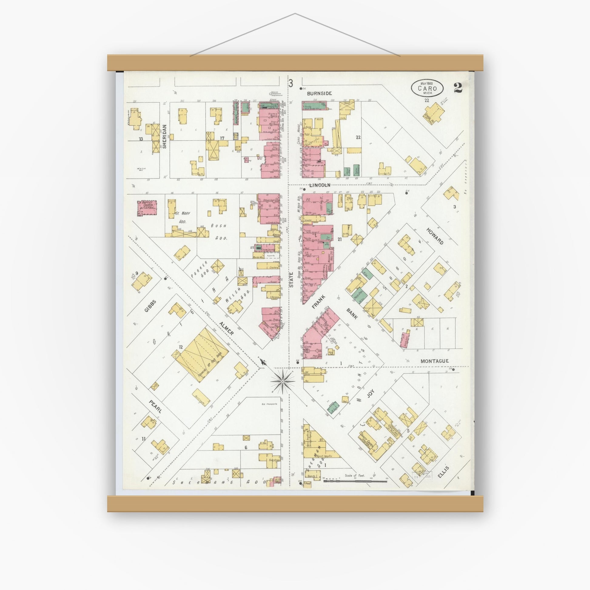 Old map wall art mockup — magnetic wood frame on white wall — Sanborn Fire Insurance Map from Caro, Tuscola County, Michigan (1900), Sheet #0002