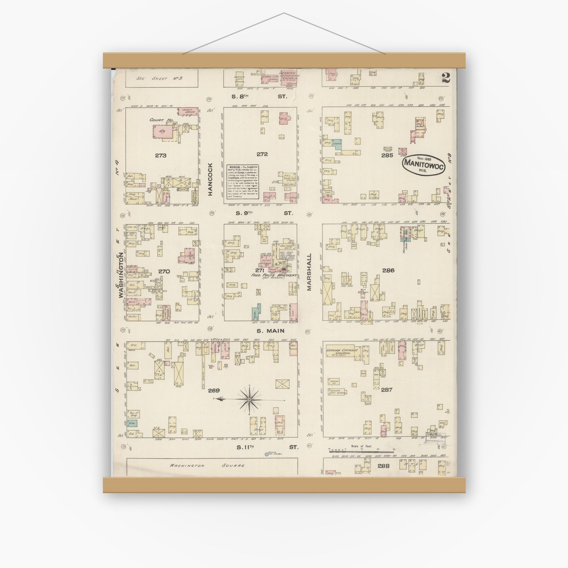 Old map wall art mockup — magnetic wood frame on white wall — Sanborn Fire Insurance Map from Manitowoc, Manitowoc County, Wisconsin (1883), Sheet #0002