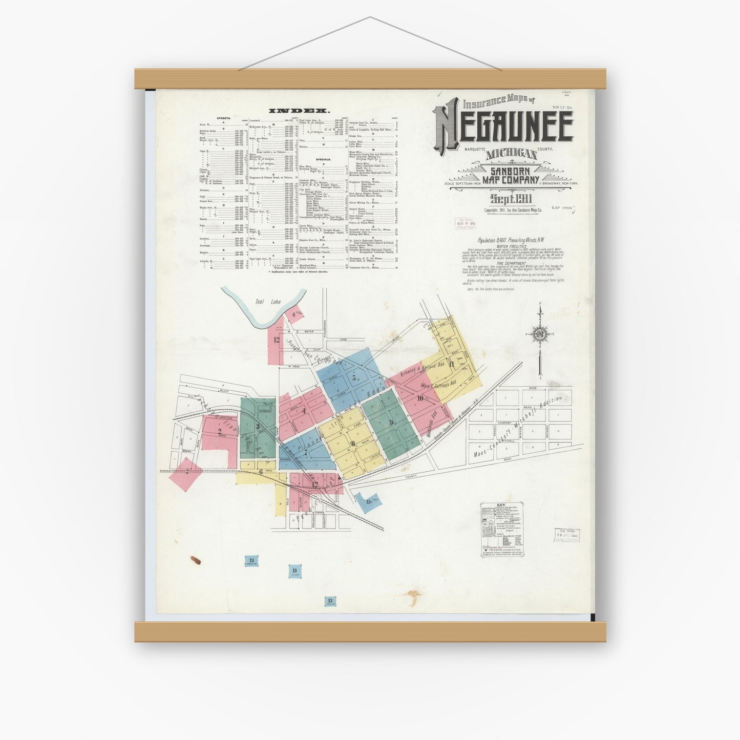 Old map wall art mockup — magnetic wood frame on white wall — Sanborn Fire Insurance Map from Negaunee, Marquette County, Michigan (1911) - Complete Map Set