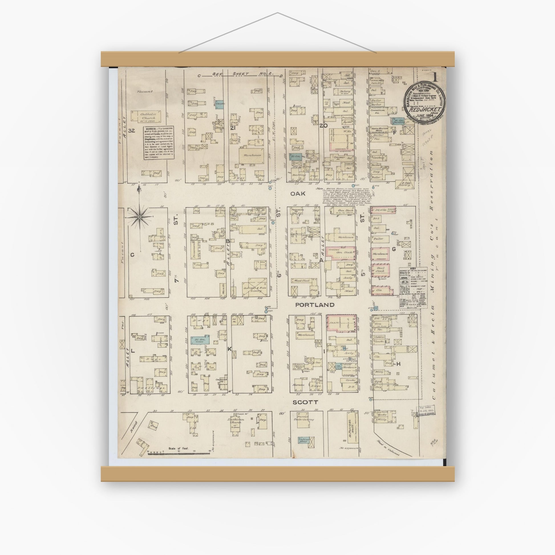 Old map wall art mockup — magnetic wood frame on white wall — Sanborn Fire Insurance Map from Red Jacket, Houghton County, Michigan (1884) - Complete Map Set