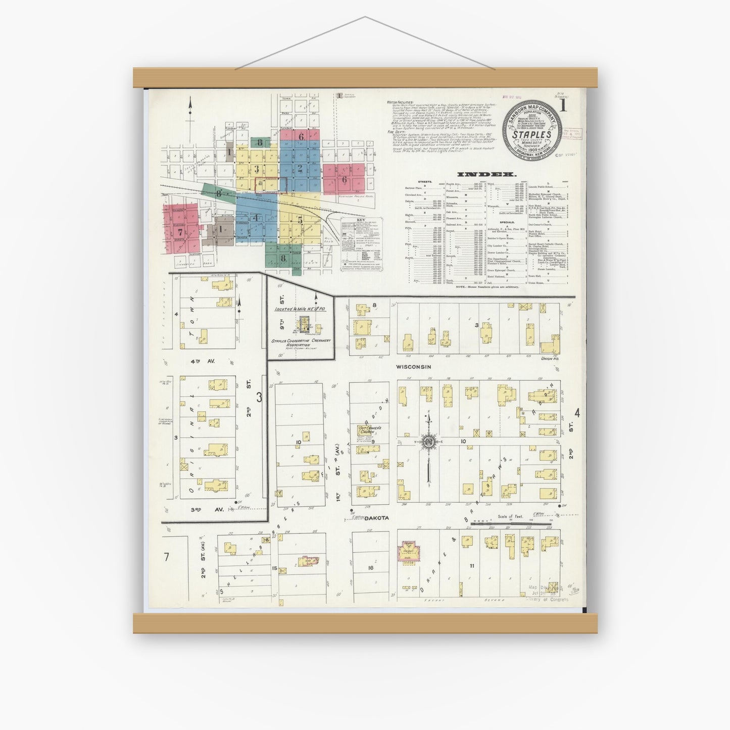 Old map wall art mockup — magnetic wood frame on white wall — Sanborn Fire Insurance Map from Staples, Todd County, Minnesota (1909) - Complete Map Set