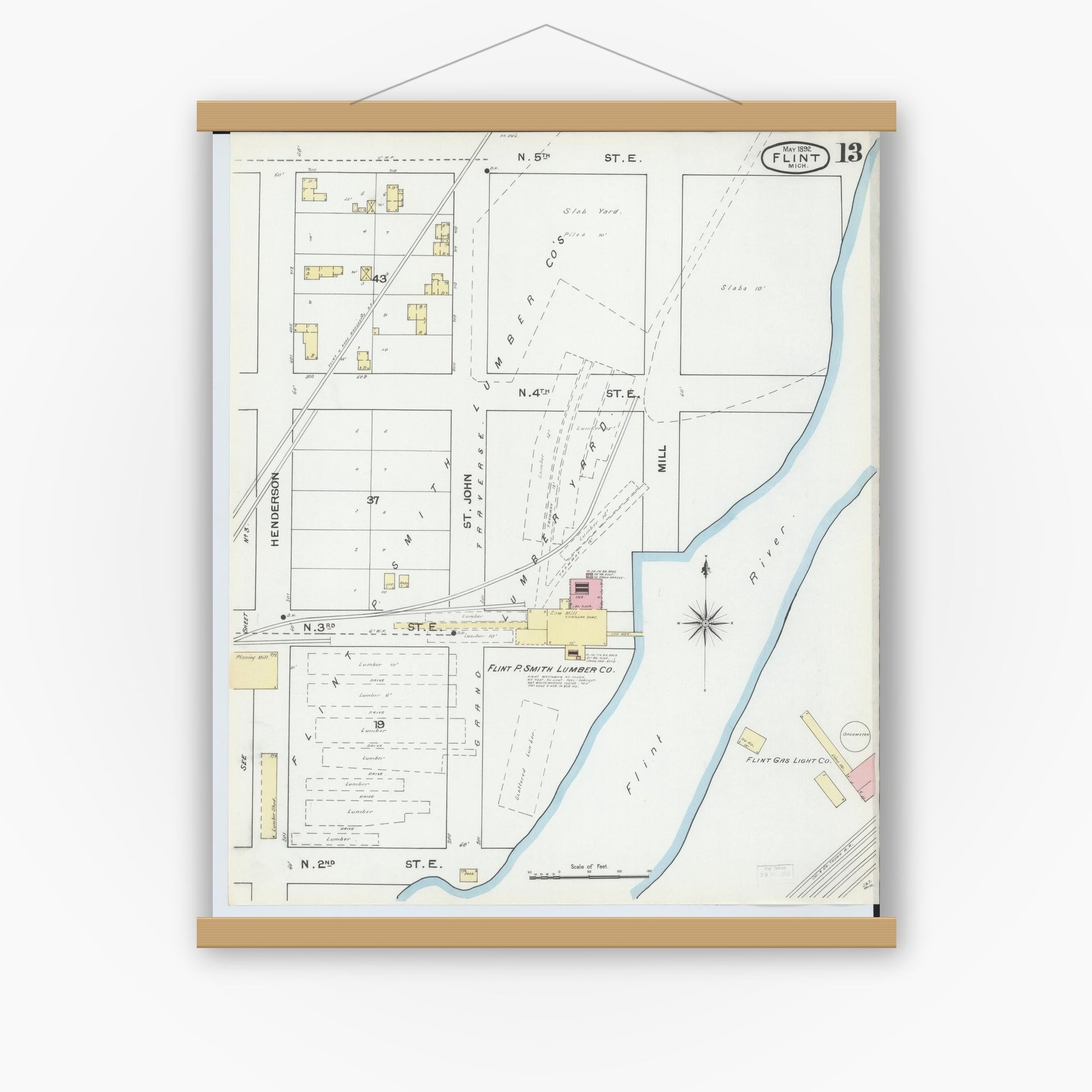 Old map wall art mockup — magnetic wood frame on white wall — Sanborn Fire Insurance Map from Flint, Genesee County, Michigan (1892), Sheet #0013