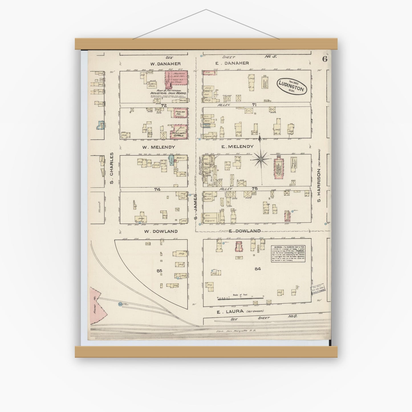 Old map wall art mockup — magnetic wood frame on white wall — Sanborn Fire Insurance Map from Ludington, Mason County, Michigan (1883), Sheet #0006