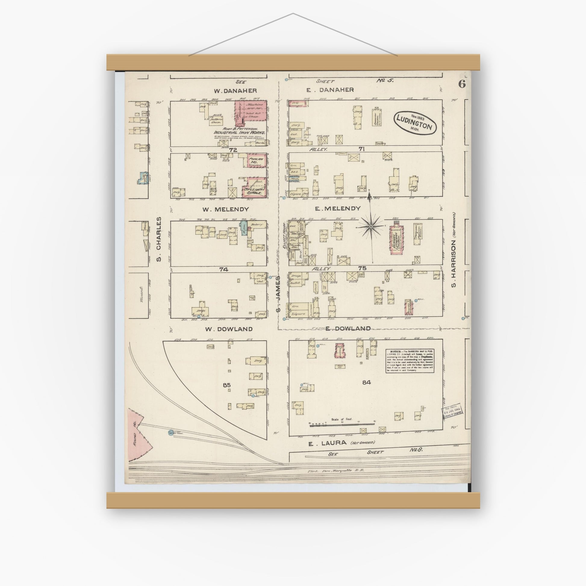 Old map wall art mockup — magnetic wood frame on white wall — Sanborn Fire Insurance Map from Ludington, Mason County, Michigan (1883), Sheet #0006