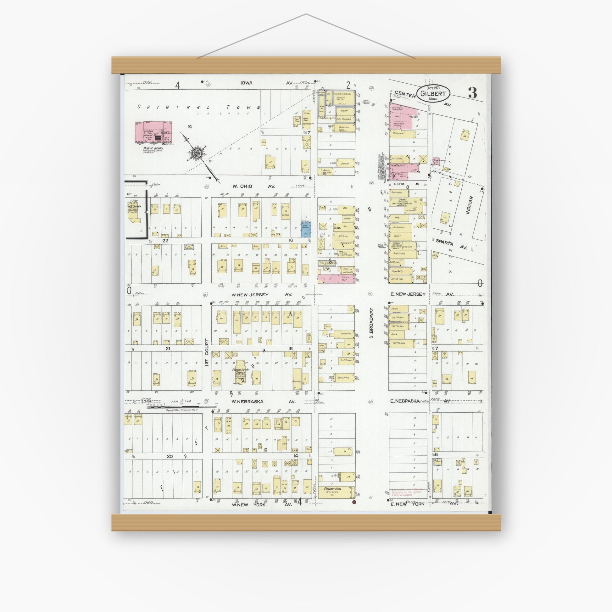 Old map wall art mockup — magnetic wood frame on white wall — Sanborn Fire Insurance Map from Gilbert, Saint Louis County, Minnesota (1921), Sheet #0003