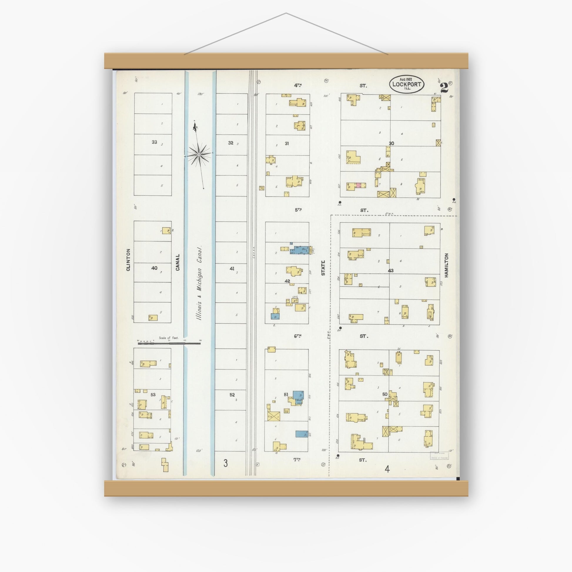 Old map wall art mockup — magnetic wood frame on white wall — Sanborn Fire Insurance Map from Lockport, Will County, Illinois (1902), Sheet #0002