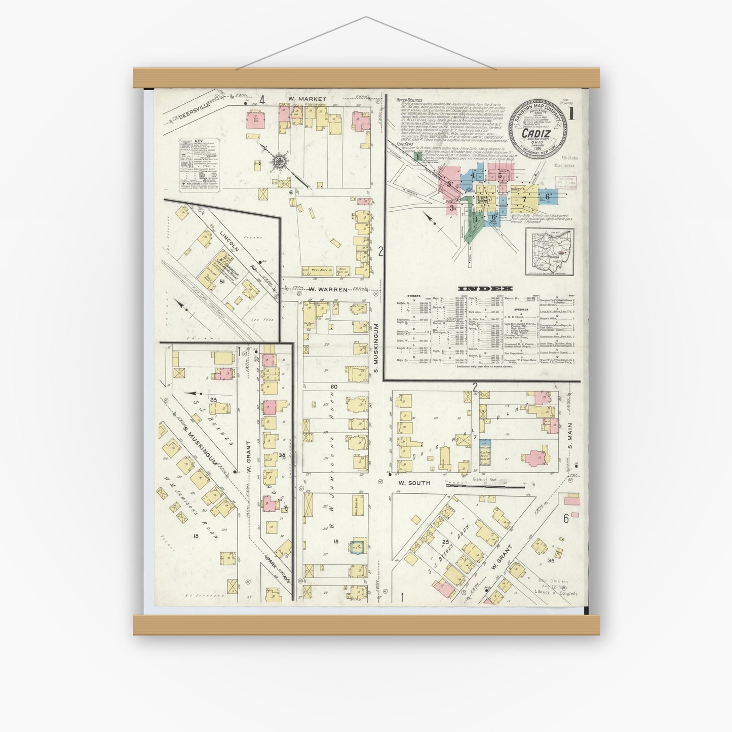 Old map wall art mockup — magnetic wood frame on white wall — Sanborn Fire Insurance Map from Cadiz, Harrison County, Ohio (1916), Sheet #0001