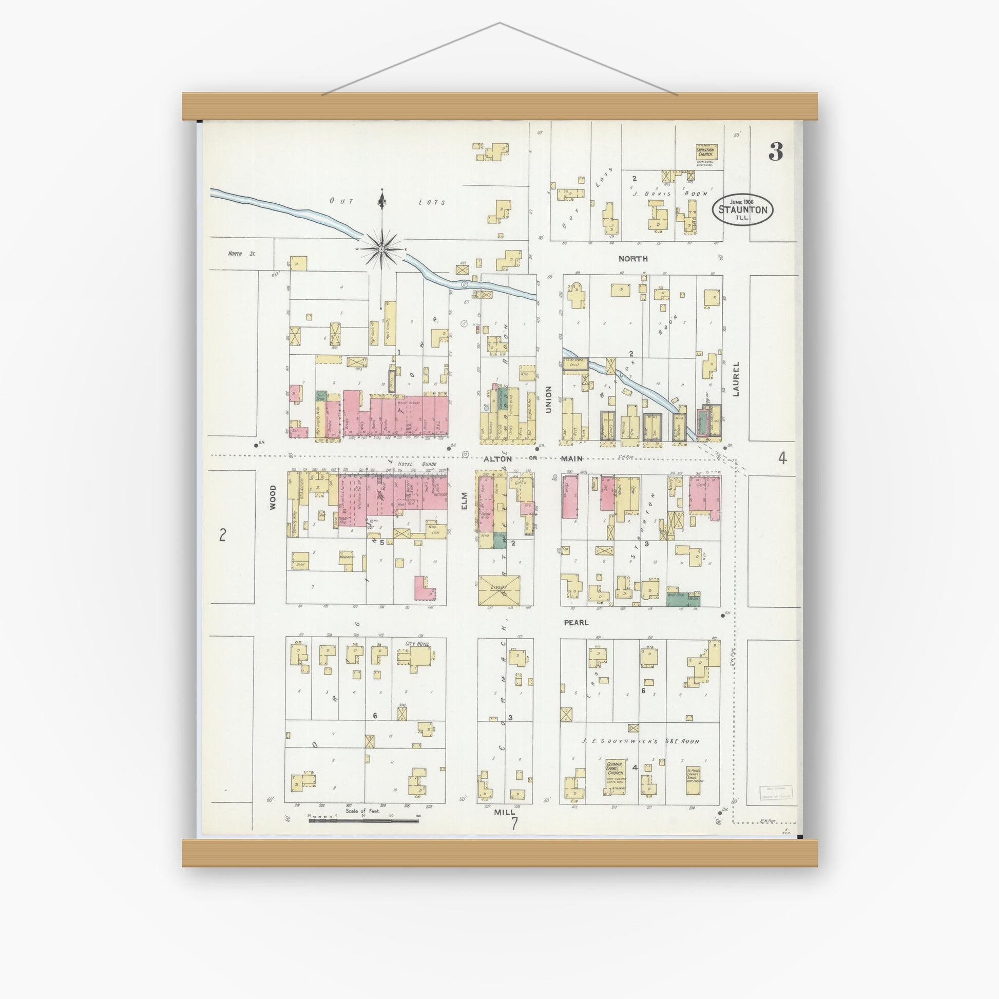 Old map wall art mockup — magnetic wood frame on white wall — Sanborn Fire Insurance Map from Staunton, Macoupin County, Illinois (1906), Sheet #0003