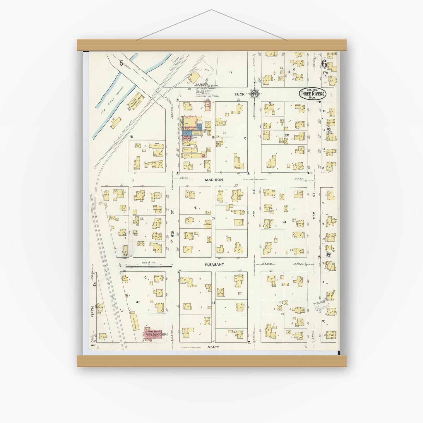 Old map wall art mockup — magnetic wood frame on white wall — Sanborn Fire Insurance Map from Three Rivers, Saint Joseph County, Michigan (1916), Sheet #0006