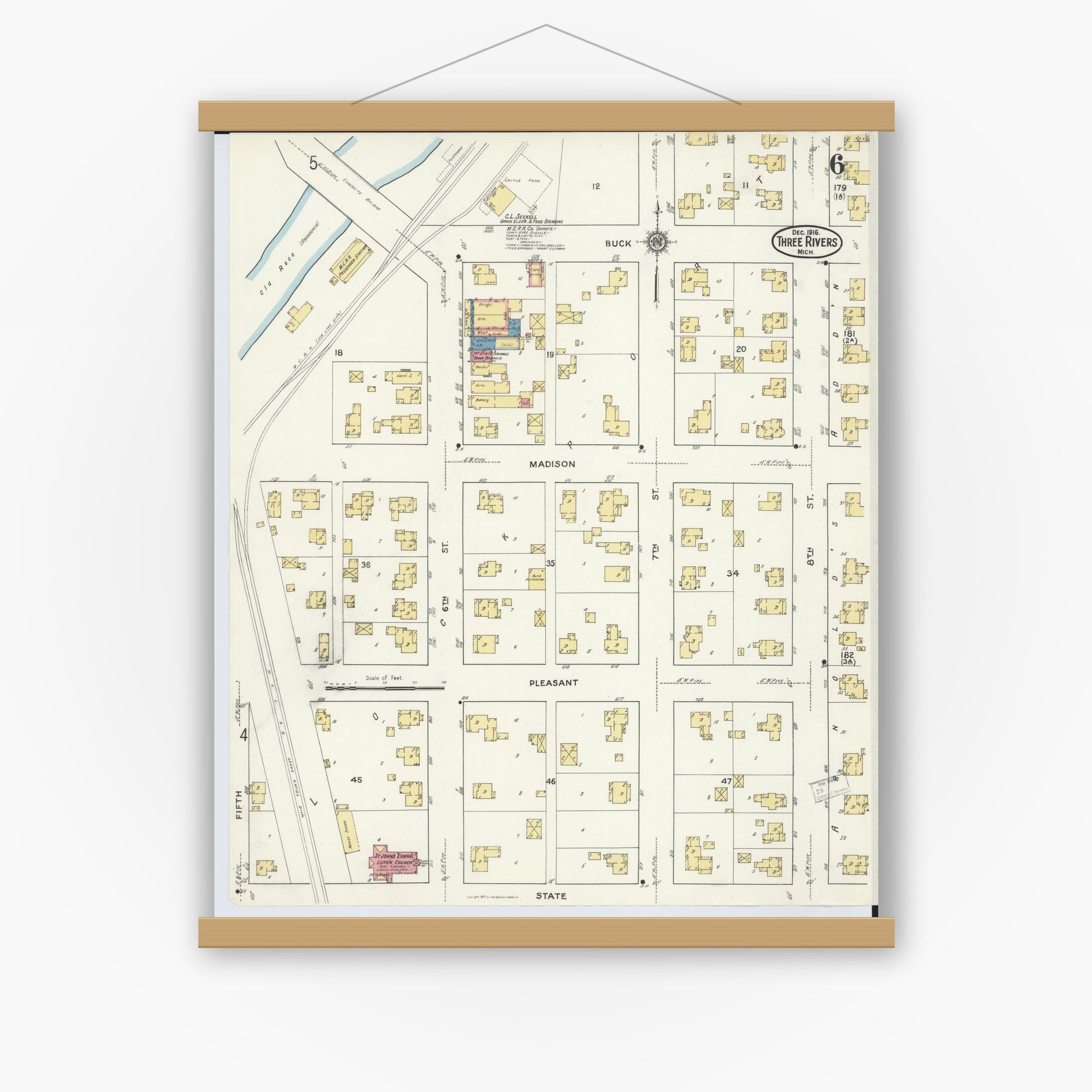 Old map wall art mockup — magnetic wood frame on white wall — Sanborn Fire Insurance Map from Three Rivers, Saint Joseph County, Michigan (1916), Sheet #0006