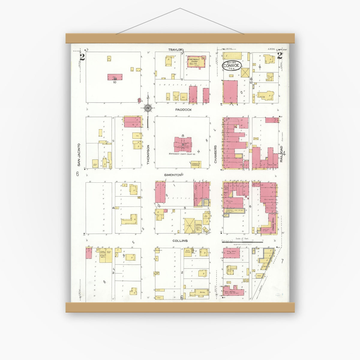 Old map wall art mockup — magnetic wood frame on white wall — Sanborn Fire Insurance Map from Conroe, Montgomery County, Texas (1923), Sheet #0002