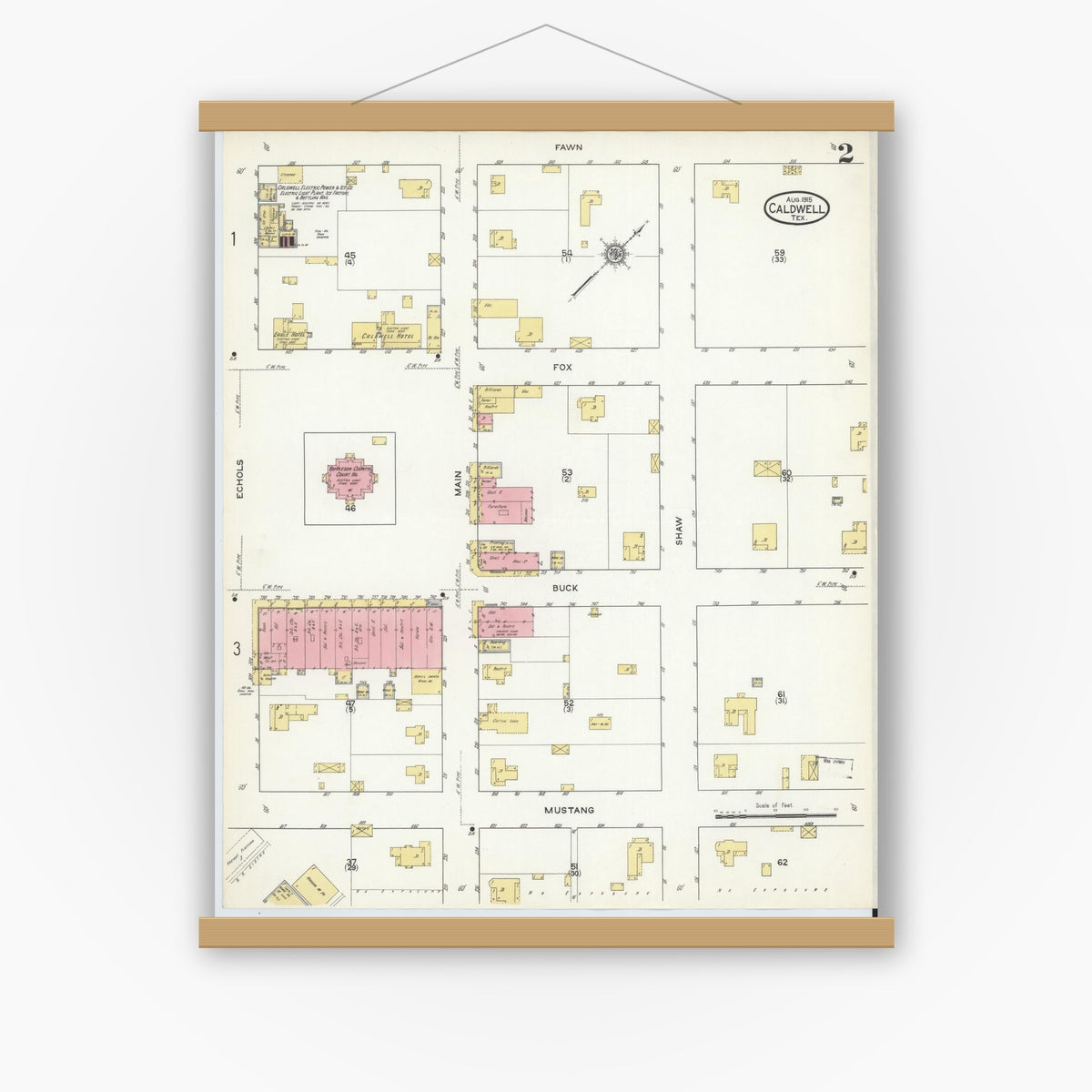 Old map wall art mockup — magnetic wood frame on white wall — Sanborn Fire Insurance Map from Caldwell, Burleson County, Texas (1915), Sheet #0002