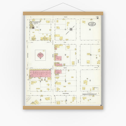 Old map wall art mockup — magnetic wood frame on white wall — Sanborn Fire Insurance Map from Caldwell, Burleson County, Texas (1915), Sheet #0002