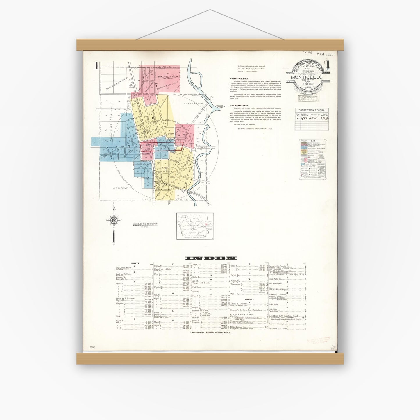 Old map wall art mockup — magnetic wood frame on white wall — Sanborn Fire Insurance Map from Monticello, Jones County, Iowa (1943) â€” Complete Set