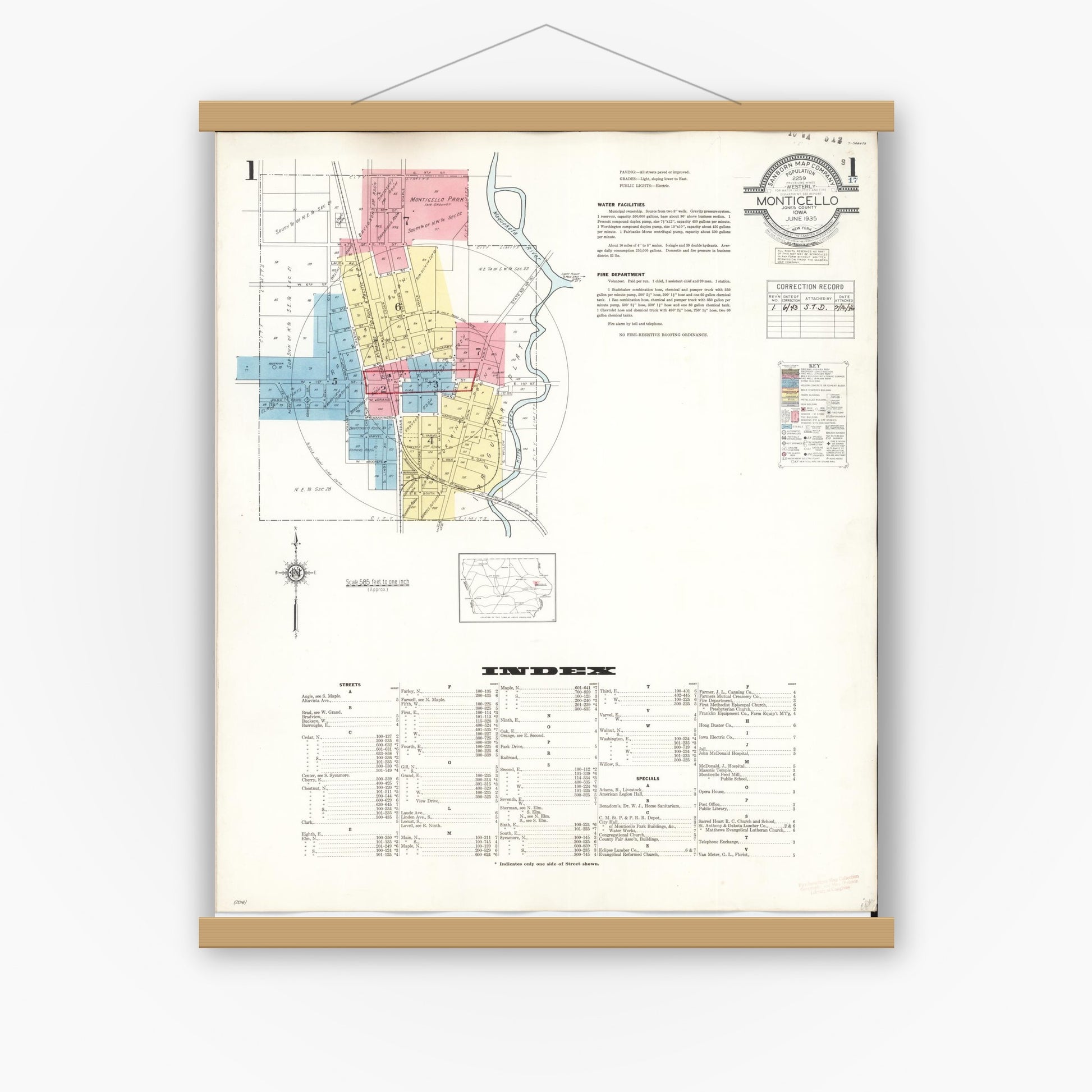 Old map wall art mockup — magnetic wood frame on white wall — Sanborn Fire Insurance Map from Monticello, Jones County, Iowa (1943) â€” Complete Set