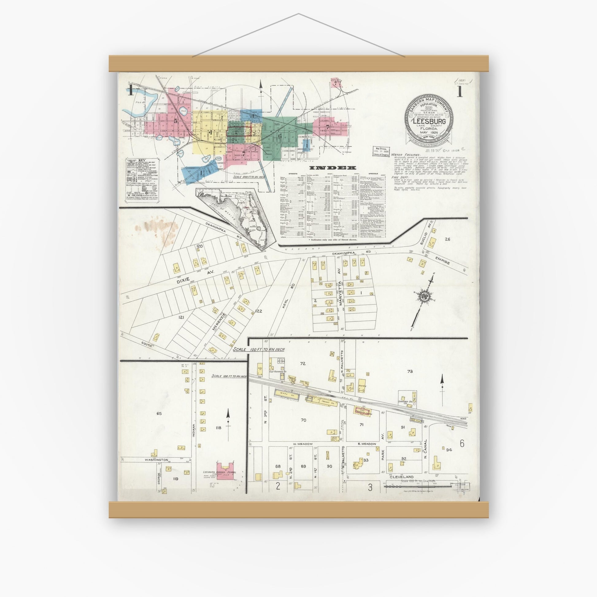 Old map wall art mockup — magnetic wood frame on white wall — Sanborn Fire Insurance Map from Leesburg, Lake County, Florida (1924), Sheet #0001
