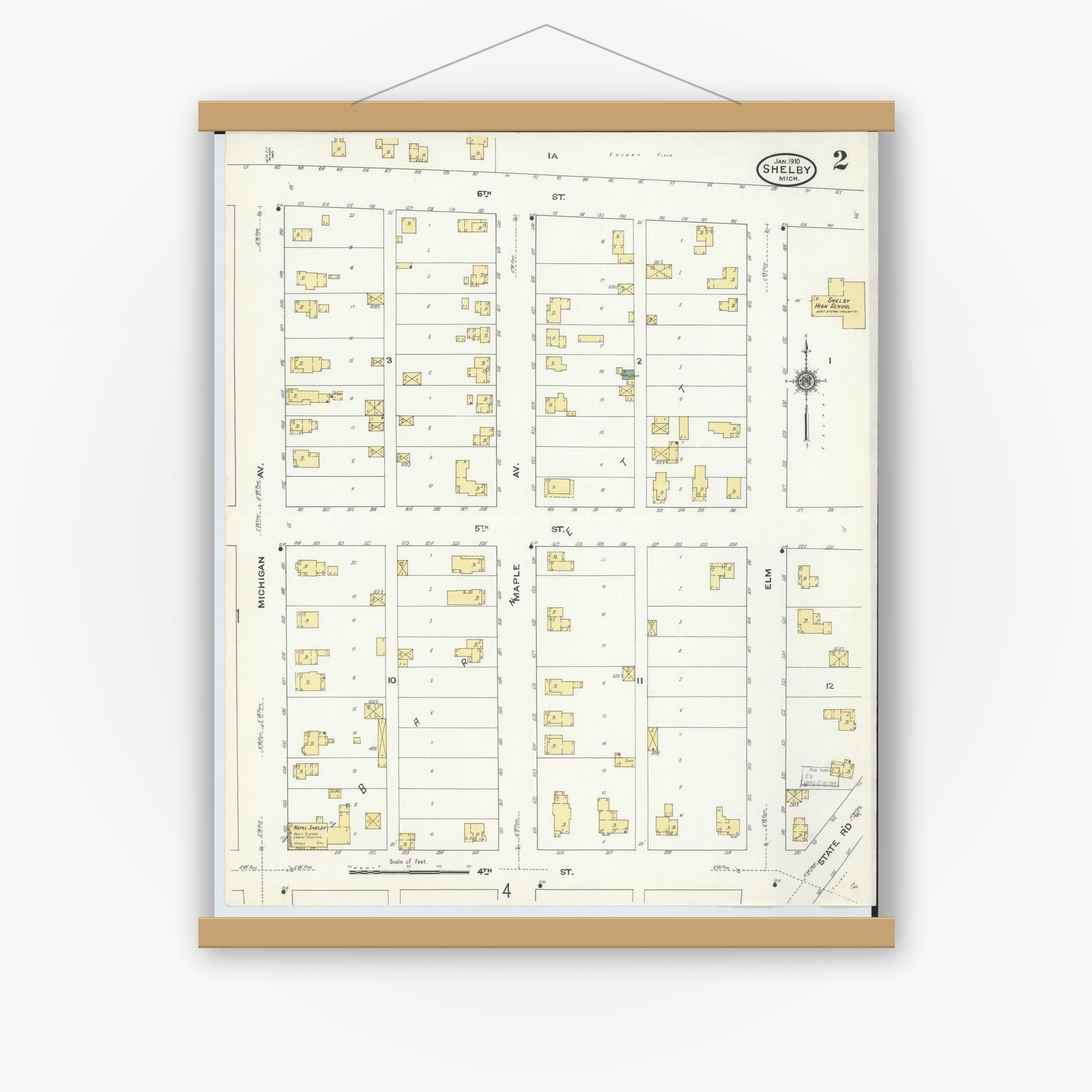 Old map wall art mockup — magnetic wood frame on white wall — Sanborn Fire Insurance Map from Shelby, Oceana County, Michigan (1910), Sheet #0002
