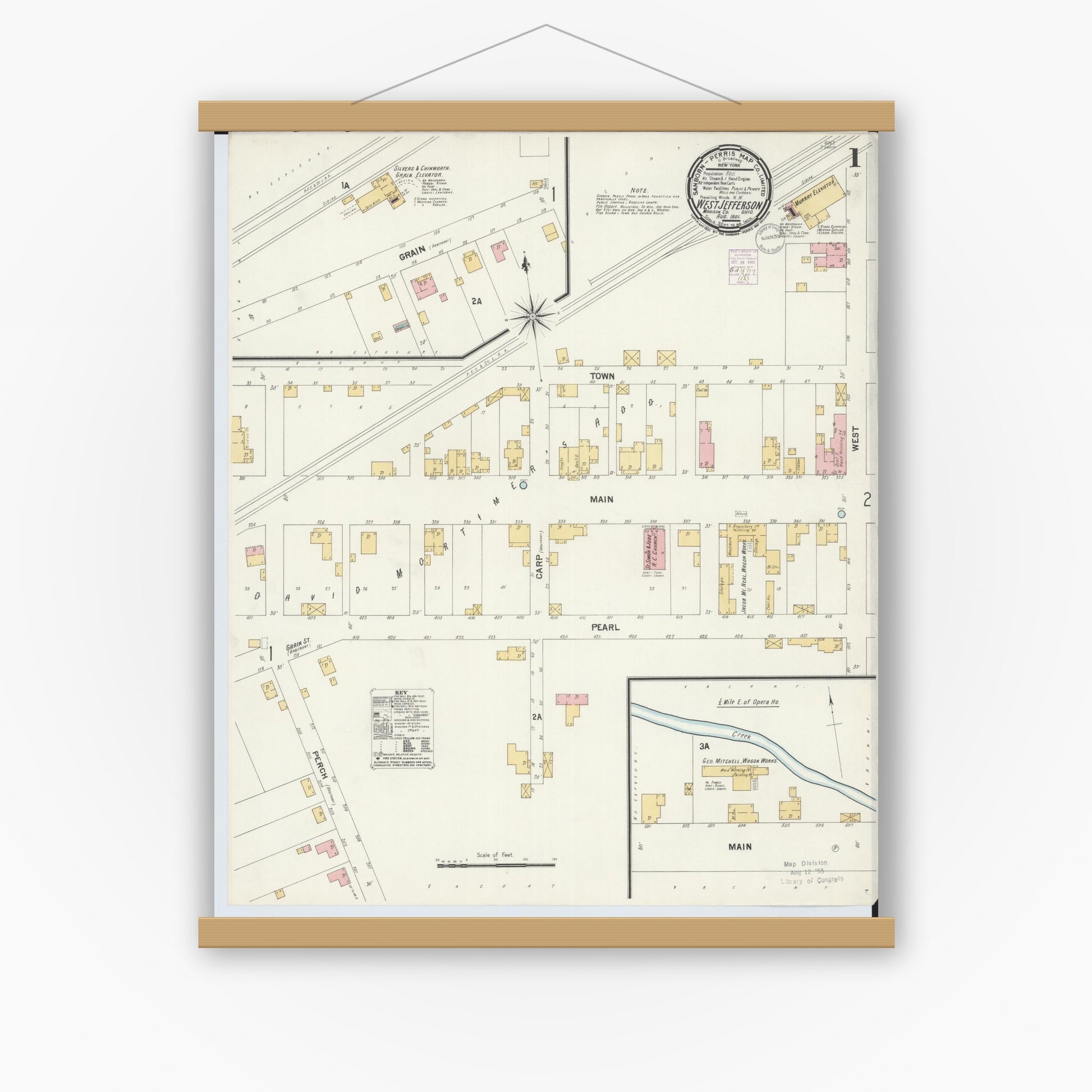 Old map wall art mockup — magnetic wood frame on white wall — Sanborn Fire Insurance Map from West Jefferson, Madison County, Ohio (1901) - Complete Map Set
