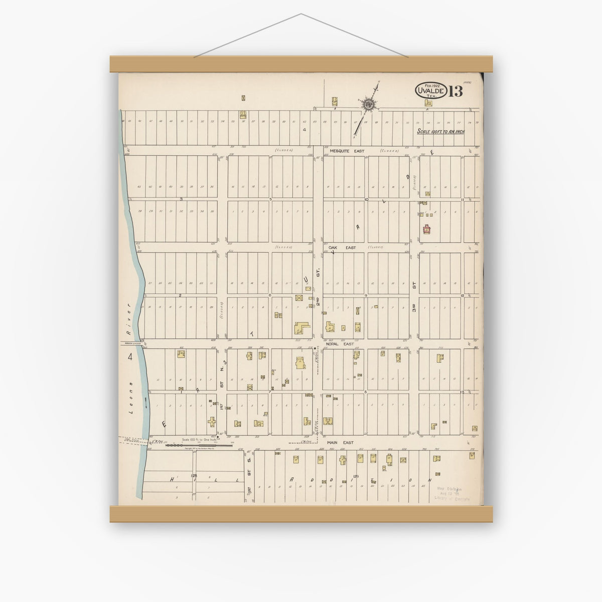 Old map wall art mockup — magnetic wood frame on white wall — Sanborn Fire Insurance Map from Uvalde, Uvalde County, Texas (1922), Sheet #0013