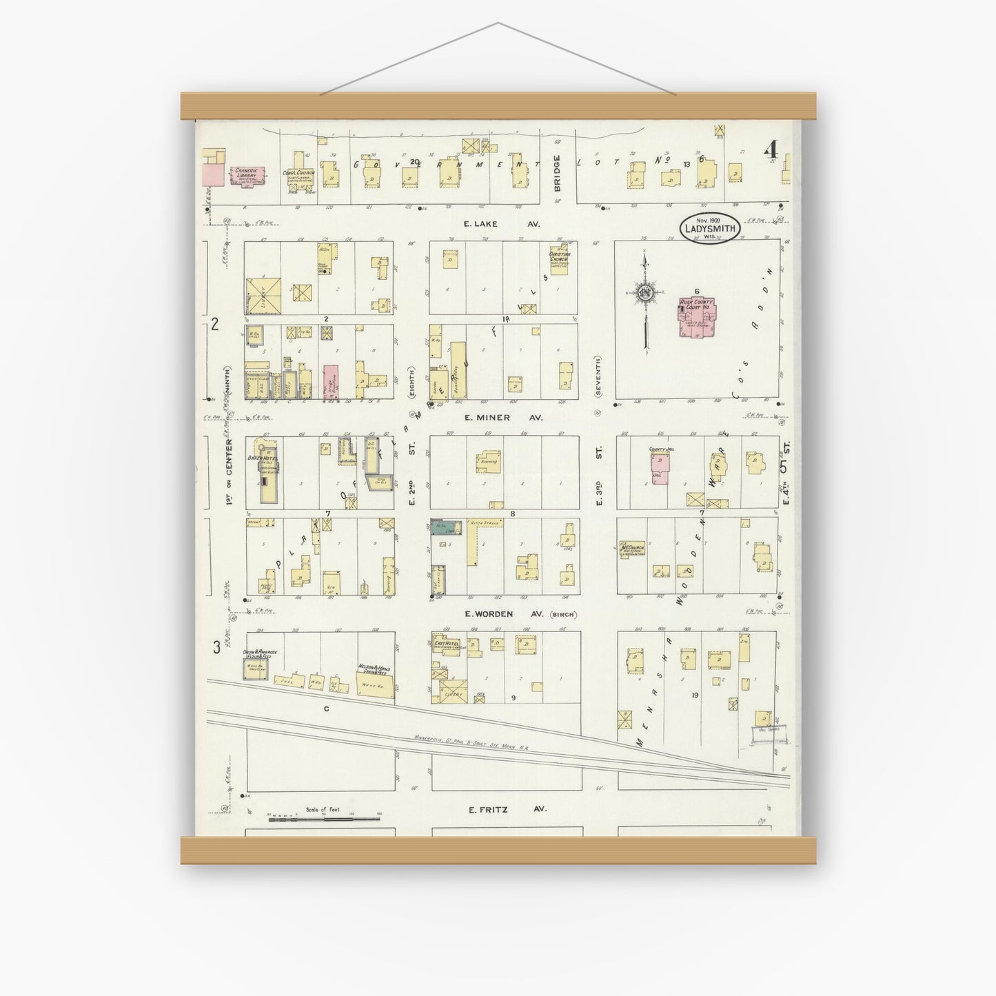 Old map wall art mockup — magnetic wood frame on white wall — Sanborn Fire Insurance Map from Ladysmith, Rusk County, Wisconsin (1909), Sheet #0004