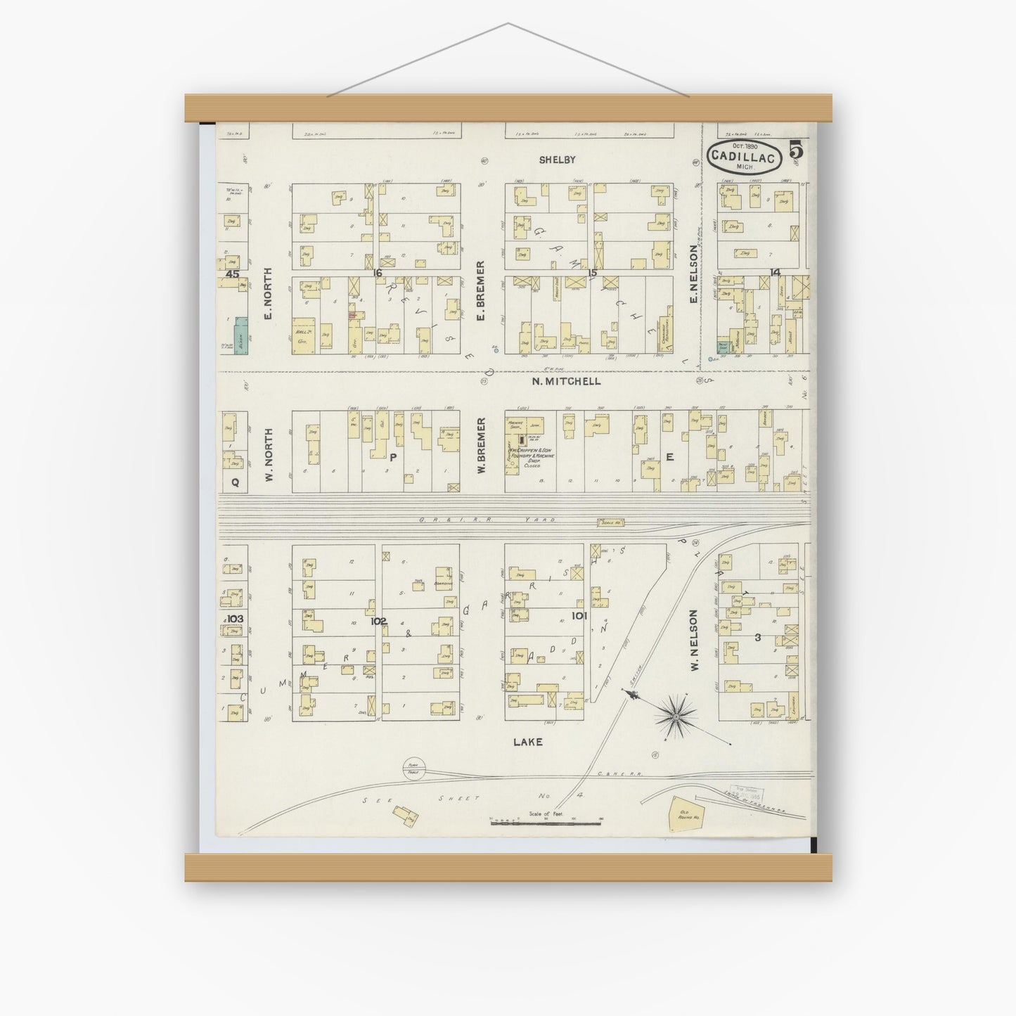 Old map wall art mockup — magnetic wood frame on white wall — Sanborn Fire Insurance Map from Cadillac, Wexford County, Michigan (1890), Sheet #0005