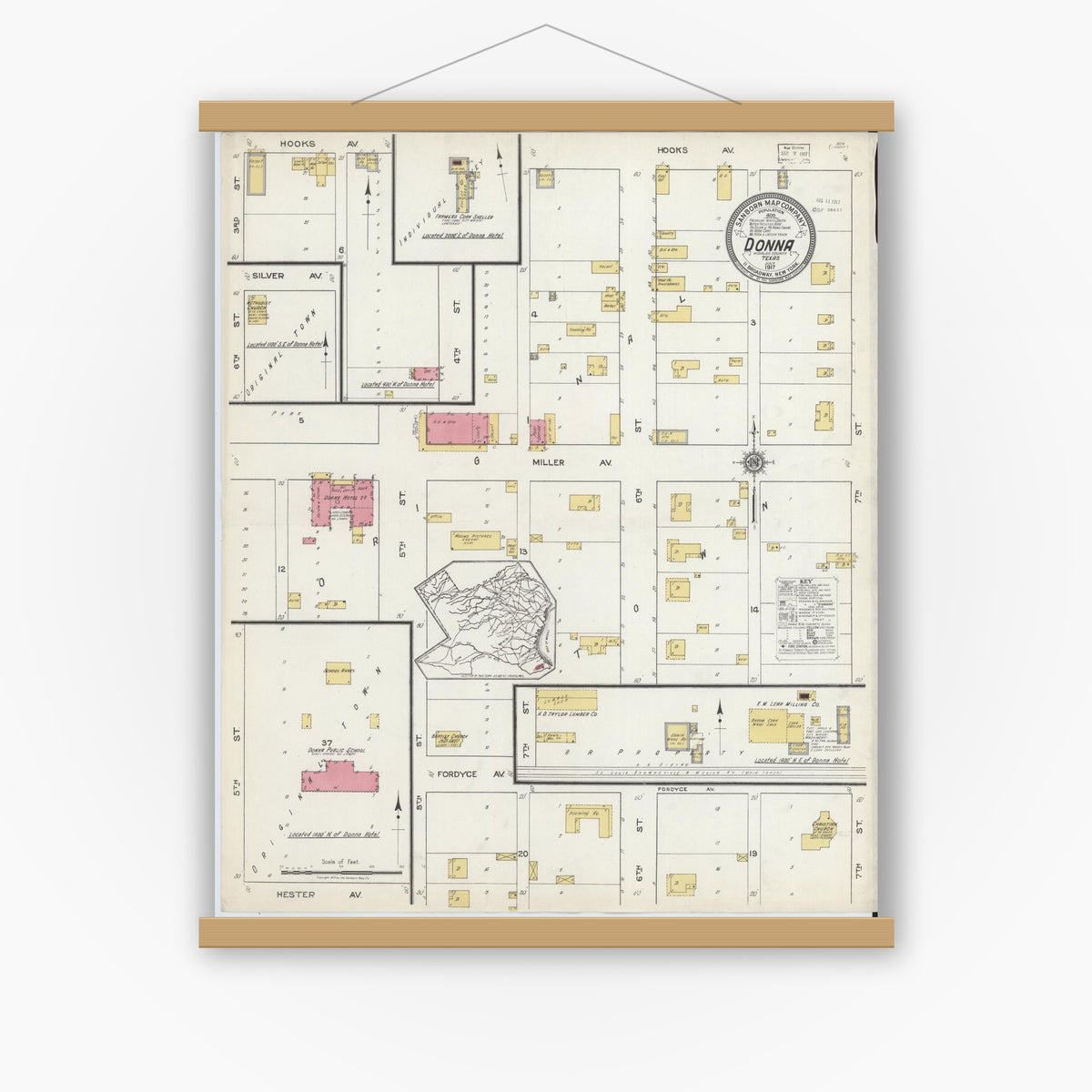 Old map wall art mockup — magnetic wood frame on white wall — Sanborn Fire Insurance Map from Donna, Hidalgo County, Texas (1917), Sheet #0001