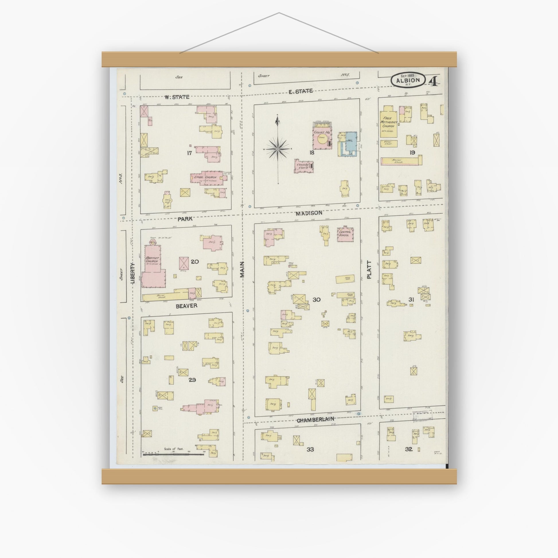 Old map wall art mockup — magnetic wood frame on white wall — Sanborn Fire Insurance Map from Albion, Orleans County, New York (1889), Sheet #0004