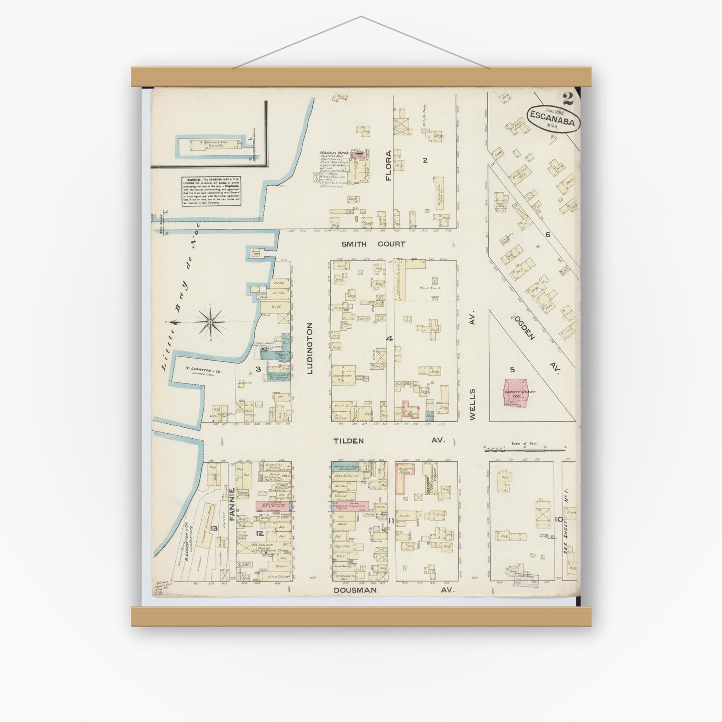 Old map wall art mockup — magnetic wood frame on white wall — Sanborn Fire Insurance Map from Escanaba, Delta County, Michigan (1884), Sheet #0002